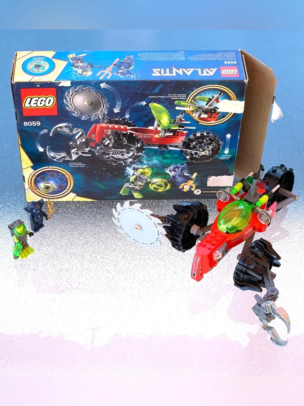 LEGO Atlantis Red Vehicle with Green Cockpit and Black Treads